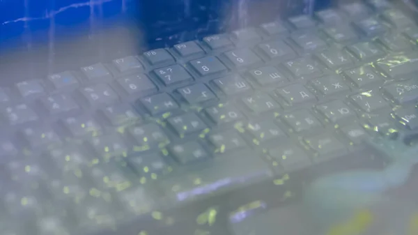 Keyboard of rugged laptop computer during water resistance test - close up
