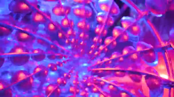 Moving parts of mechanical contemporary art installation with colorful light — Stock Video