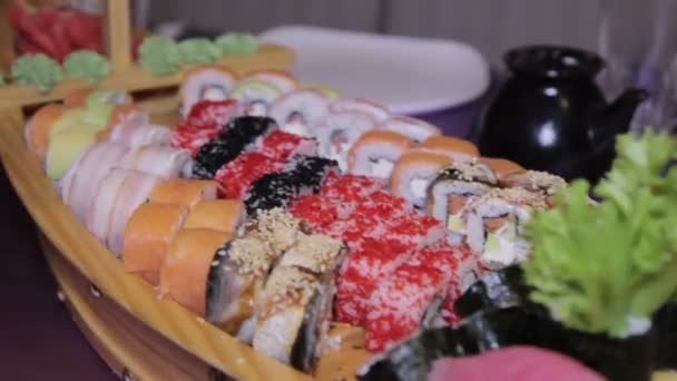 Variety of japanese sushi rolls — Stock Video