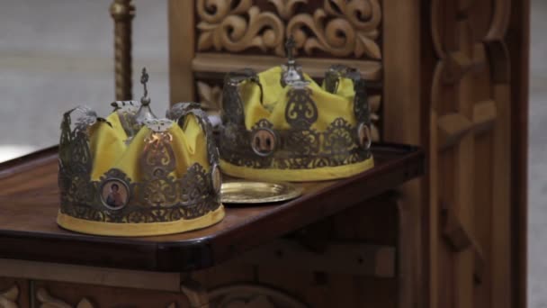 Two Orthodox Wedding Ceremonial Crowns Ready for Ceremony — Stock Video