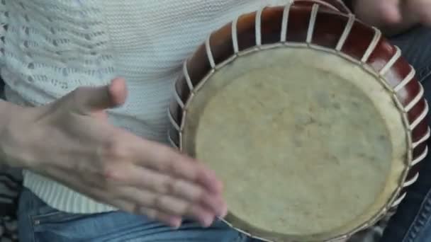 Women playing on Jambe Drum on nature — Stock Video