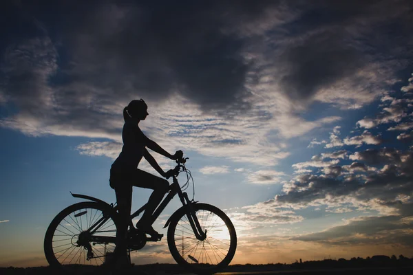 Girl on the bike — Stock Photo, Image