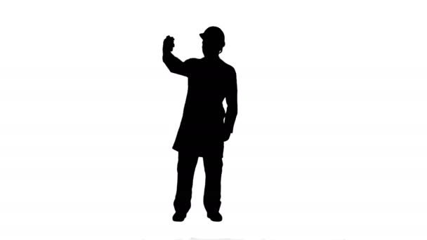 Silhouette Ingegnere o architetto scattare un selfie mostrando gesto pista opaca . — Video Stock