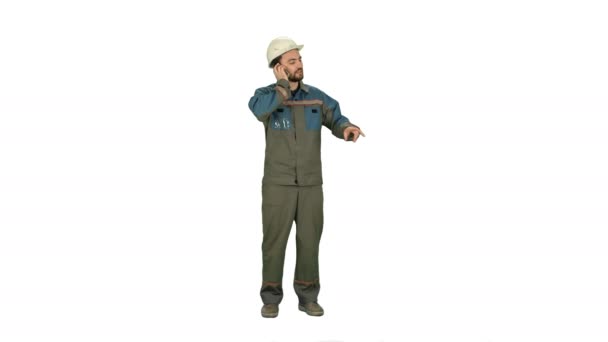 Oil Worker calling by phone during business break on white background. — Stock Video