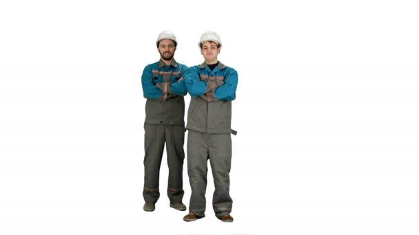 Industry, building, construction and people concept - happy male builders on white background. — Stock Video