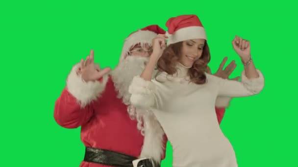 Santa Claus danza con la atractiva dama de Navidad en una pantalla verde Chrome Key — Vídeo de stock