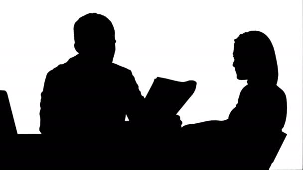Silhouette Doctor and patient discussing - visit in the office track matte — Stock Video