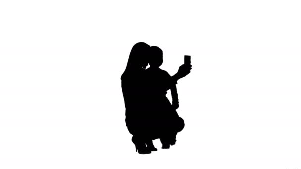 Silhouette Mother And Son Posing For Selfie — Stock Video