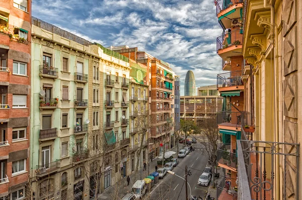 Picturesque houses of barcelona with Agbar Tower — Stock Photo, Image