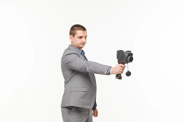 Mano de hombre sosteniendo una cámara térmica aislada sobre fondo blanco —  Fotos de Stock