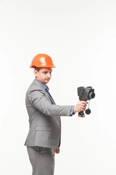 Mano de hombre sosteniendo una cámara térmica aislada fondo blanco — Foto de Stock
