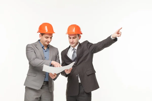 Builders with blueprints — Stock Photo, Image