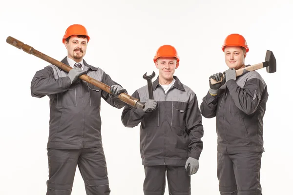 Caucásico joven diferente manual trabajador colección aislado en blanco — Foto de Stock