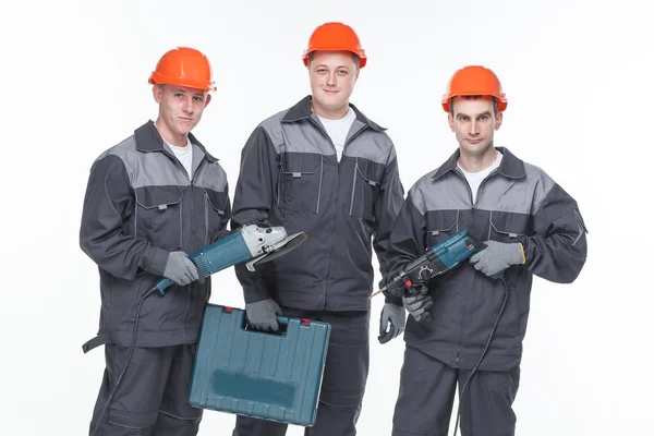 Caucásico joven diferente manual trabajador colección aislado en blanco — Foto de Stock