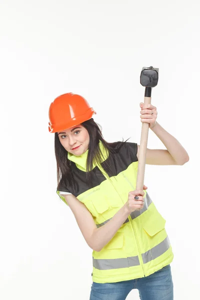 Girl in a yellow vest with the tool — Stock Photo, Image