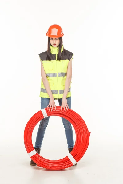 Chica uniforme bobina tubería trabajador — Foto de Stock
