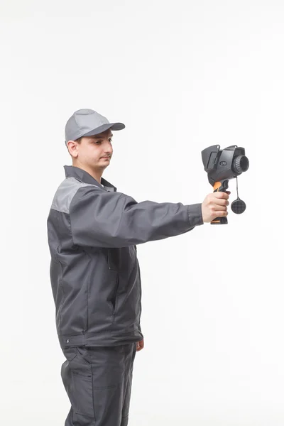 Working with the thermal imager in hands of Stock Image