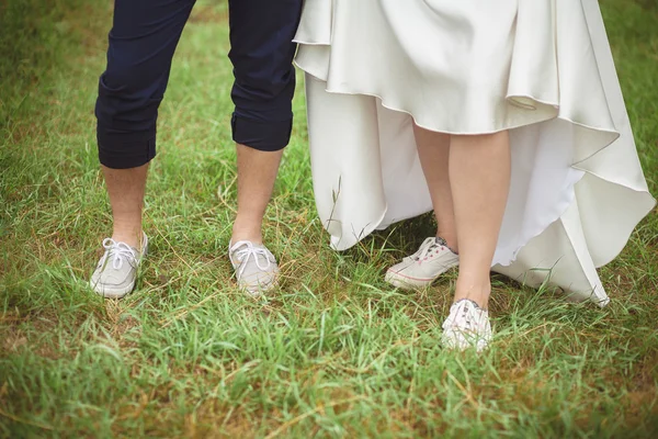 Bride and groom legs — Stock Photo, Image