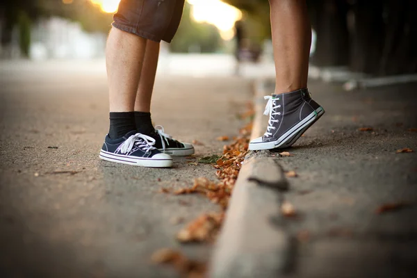 Sneakers, asphalt, pair — Stock Photo, Image