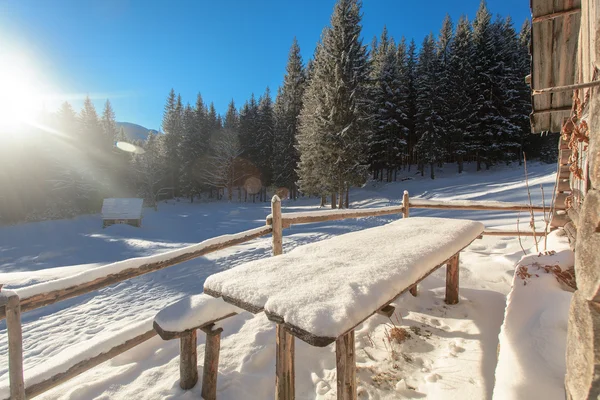 Sunrise, winter, mountain chalets — Stock Photo, Image