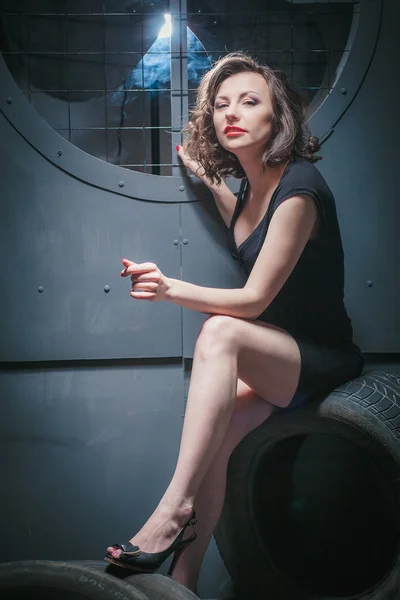 Woman studio portrait image of a black dress — Stock Photo, Image