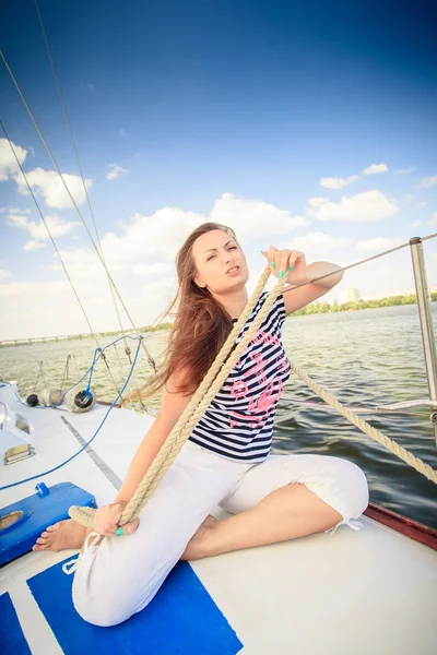 Sexy girl on the deck yacht — Stock Photo, Image