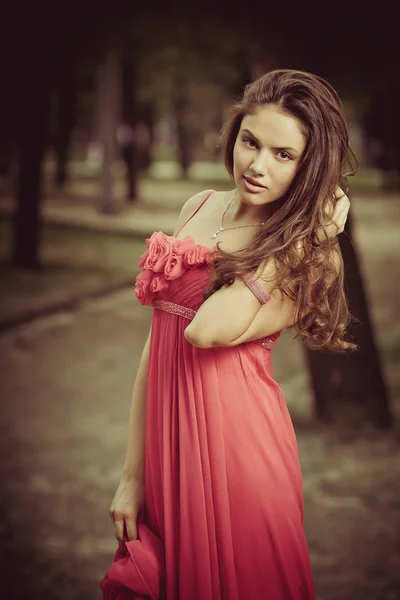 Girl in red dress — Stock Photo, Image