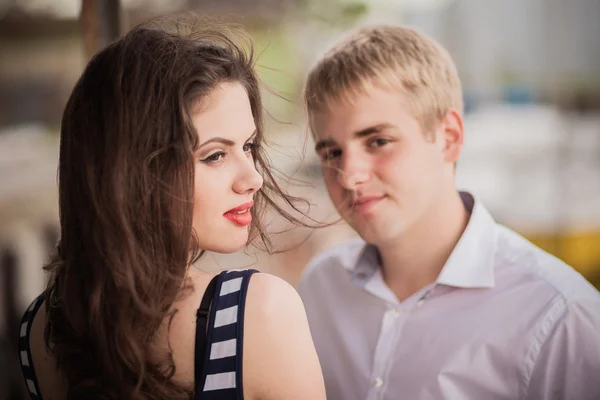 Man looks on woman — Stock Photo, Image