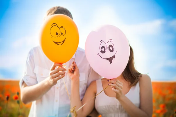 Globos, cara cerrada, sonrisa —  Fotos de Stock