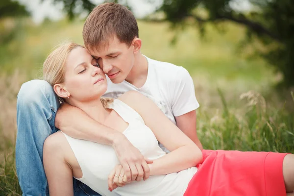 Close-up, couple lying on the grass — Stock Photo, Image