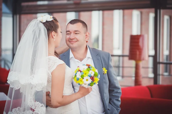 Groom and bride on the terrace — Stock Photo, Image