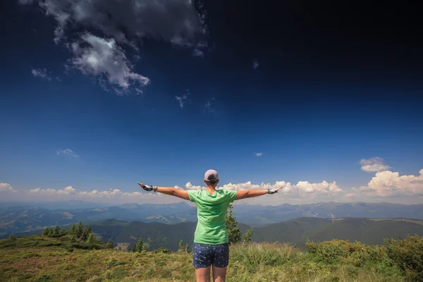 Woman standing on top — Stock Photo, Image