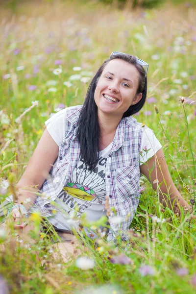 Cheerful woman wildflowers — Stock Photo, Image