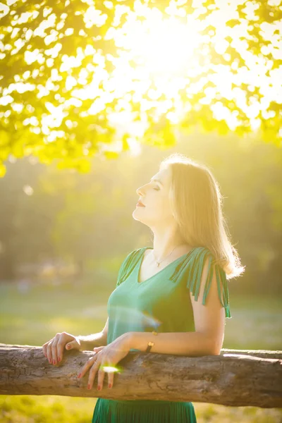 Portrait sexy woman in green dress — Stock Photo, Image