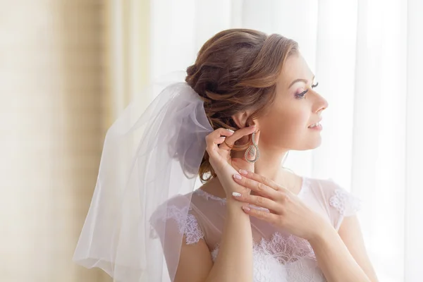 Cheerful and gentle charming bride — Stock Photo, Image