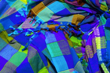 Eşsiz ve çekici dokusu olan canlı kumaş kumaş renkli tasarım arka planı