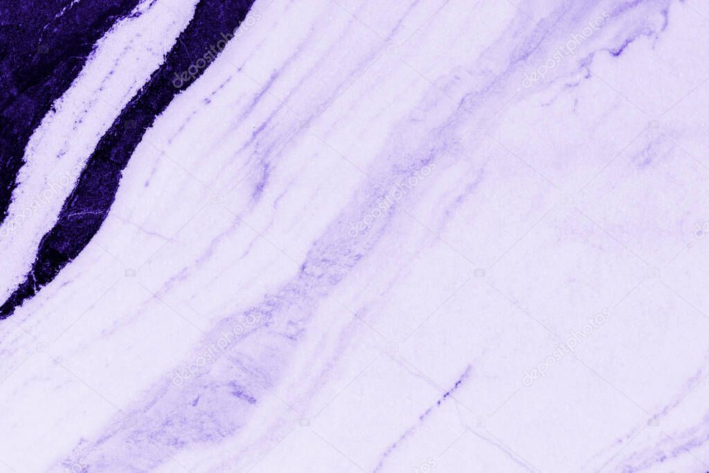 Close up of a purple blue and white marble textured wall
