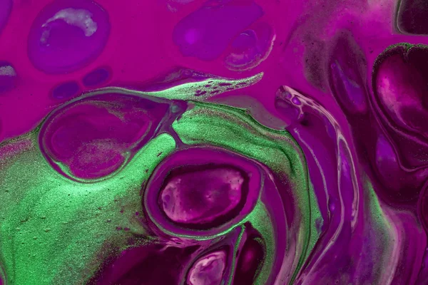 Abstract fluid art background purple and green colors. Liquid acrylic painting on canvas with sapphire gradient and splash. Watercolor backdrop with bronze waves pattern.