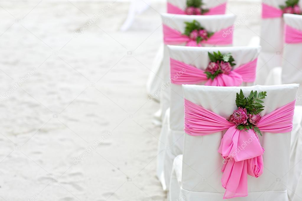 flower decoration chair at wedding venue on the beach