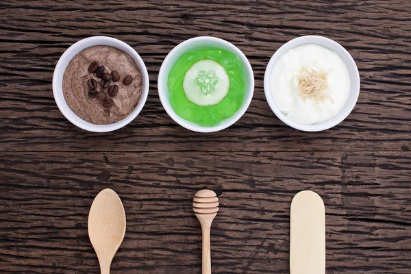 Homemade body scrubs on wood background — Stock Photo, Image