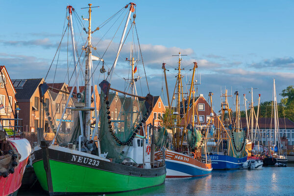 Crab cutter in the fishing port in Neuharlingersiel. Neuharlingersiel is located in East Frisia on the German North Sea coast.