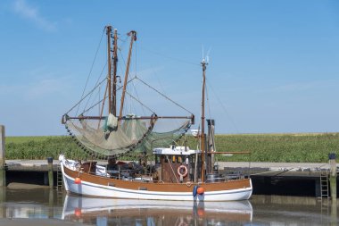 Shrimp cutter in the natural harbour of Spieka. Spieka is located in East Frisia on the German North Sea coast.