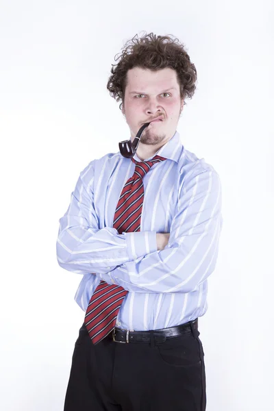 Businessman smoking a pipe — Stock Photo, Image