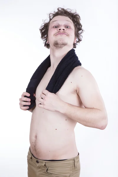 Strong man with towel — Stock Photo, Image