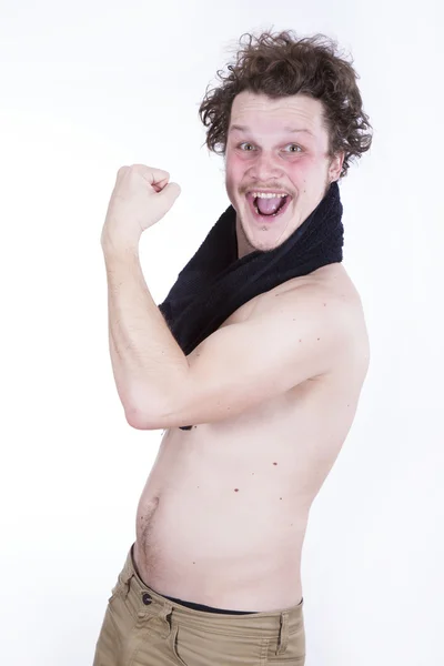 Strong man with towel — Stock Photo, Image