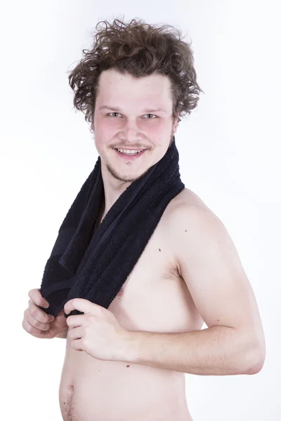 Strong man with towel — Stock Photo, Image