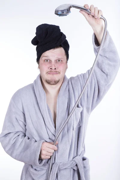 Man in bathrobe in the shower — Stock Photo, Image