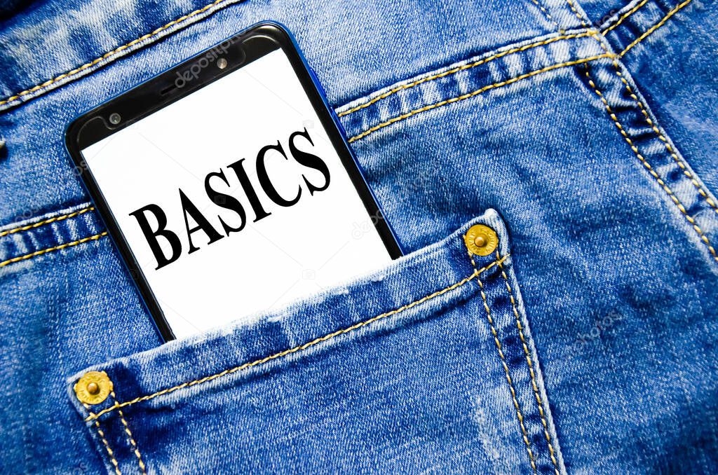BASIC the text is written on the white screen of the phone shortly lies in jeans
