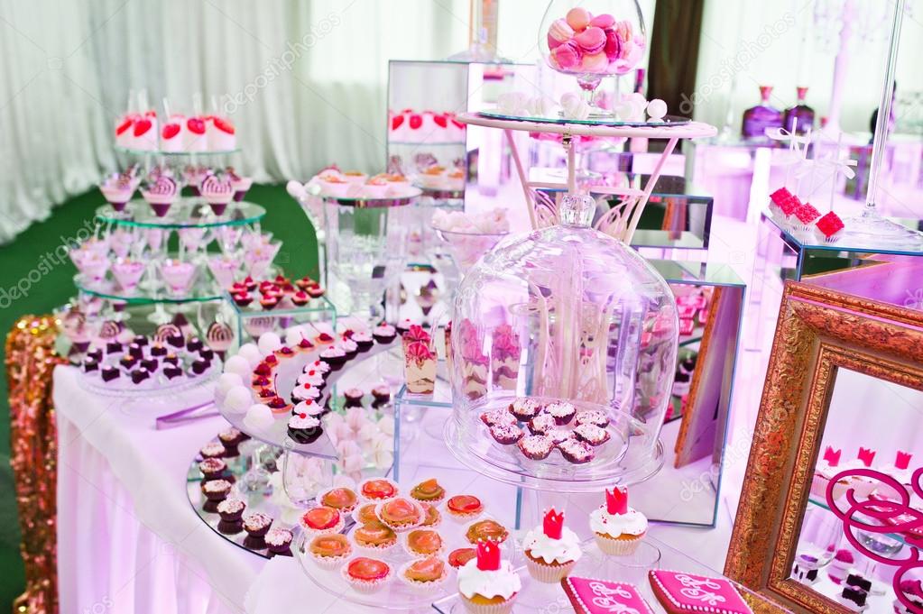 Awesome Wedding Reception Of Food And Drink With Various Pink Li