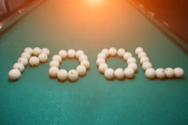 The word pool from billiard balls, blured effect — Stock Photo, Image